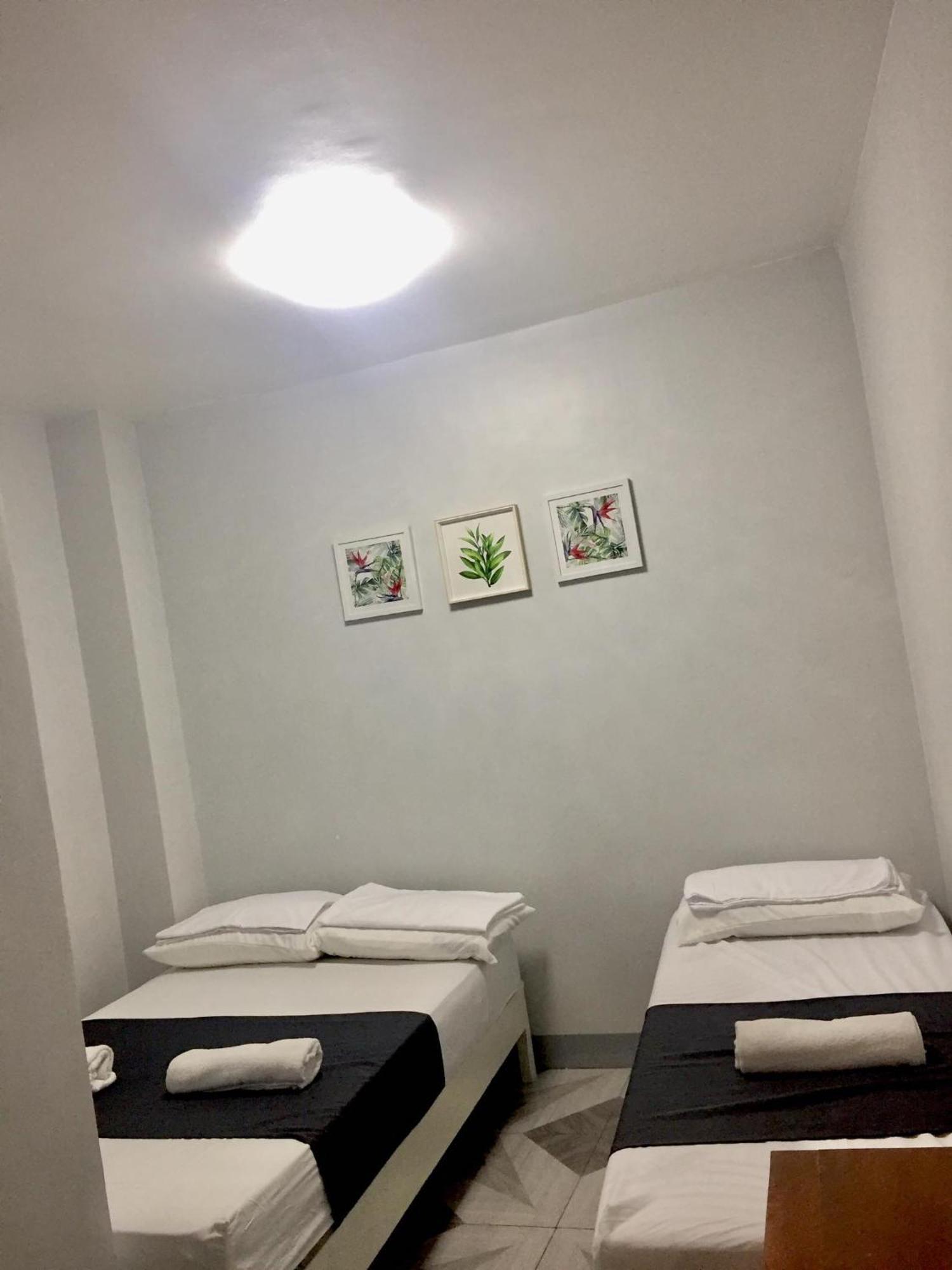 Ziet Hotel Mambajao Habitación foto